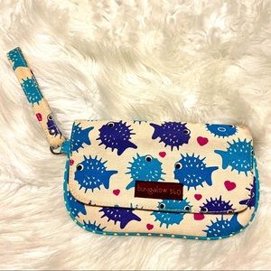 Bungalow 360 wristlet with strap with puffer fish print